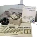 1985 commodore vintage commodore 128 computer product_feature_image from Gimme80s.com, home of your favorite 1980s 1990s 2000s toys, fashion, electronics, and more
