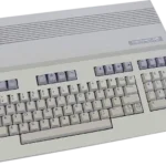 1985 commodore vintage commodore 128 computer product_front_image from Gimme80s.com, home of your favorite 1980s 1990s 2000s toys, fashion, electronics, and more