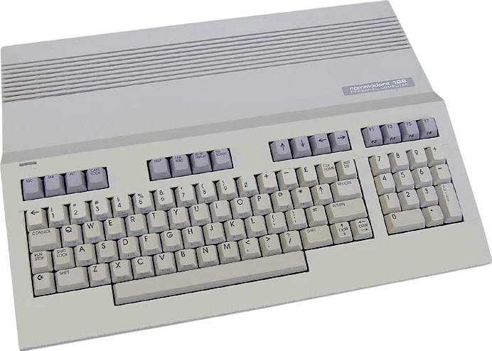 1985 commodore vintage commodore 128 computer product_front_image from Gimme80s.com, home of your favorite 1980s 1990s 2000s toys, fashion, electronics, and more