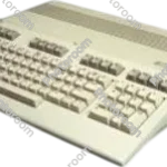 1985 commodore vintage commodore 128 computer product_side_image from Gimme80s.com, home of your favorite 1980s 1990s 2000s toys, fashion, electronics, and more