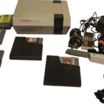 1985 nintendo nintendo nes 001 control deck product feature image 1985 nintendo nintendo nes 001 control deck product_feature_image from Gimme80s.com, home of your favorite 1980s 1990s 2000s toys, fashion, electronics, and more